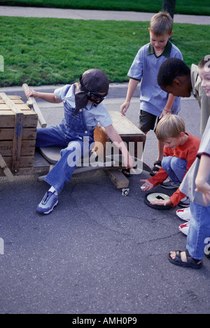 Group of Children Building Soapbox Car Stock Photo