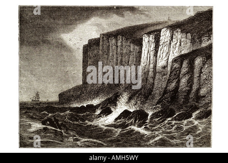 Beachy Head East Sussex foot cliff  bad weather storm waves cloud wind boat foam coast inshore nautical UK GB shore rocks surf s Stock Photo