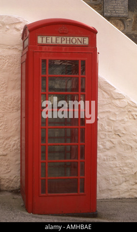 Old red english telephone box number 2111 Stock Photo