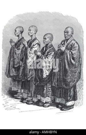 1890 bonze praying Buddhist monk far east asia traditional costume shaved head robe Chinese Japanese japan clergy bhikkhu orient Stock Photo
