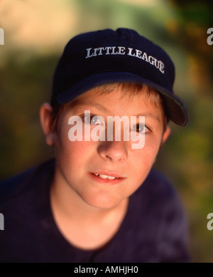 Portrait of Boy Wearing Little League Hat Stock Photo