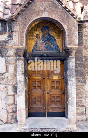 The church door with mosaic artwork on the Kapnikarea Church in Athens Greece Stock Photo