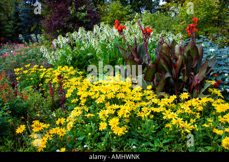 A colorful flower bed arrangement in the English Gardens of the Assiniboine Park in Winnipeg Manitoba Canada Stock Photo