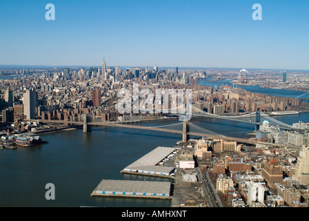 aerial view above East river with Brooklyn and Williamsburg bridges Manhattan New York city Stock Photo