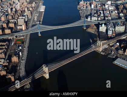 aerial view above Brooklyn and Williamsburg bridges New York city over East river Stock Photo