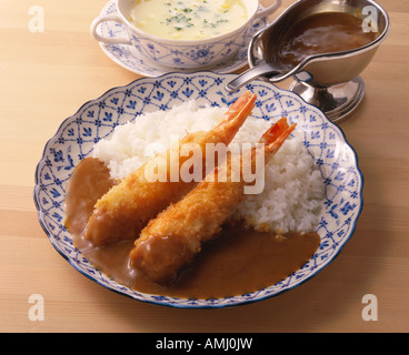 Curry and rice with deep-fried prawns Stock Photo