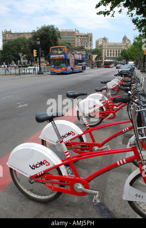 rental bikes parked along Placa de Catalunya Barcelona Spain Stock Photo