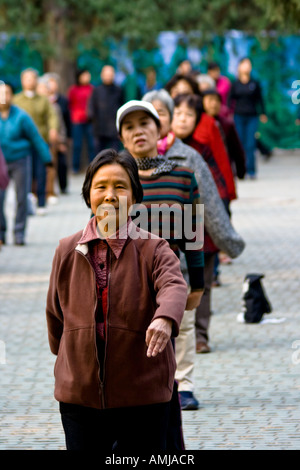 Cute Little Old Chinese Woman in Group Exercise Temple of Heaven Park Beijing China Stock Photo