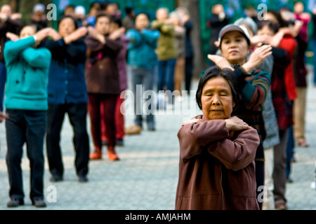 Cute Little Old Chinese Woman in Group Exercise Temple of Heaven Park Beijing China Stock Photo