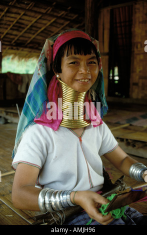 A longneck woman from the karen tribe weaving