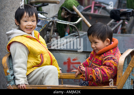 Chinese Boys Playing in the Hutong Beijing China Stock Photo