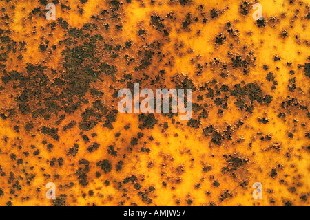 Horizontal close up of rusting yellow metal Stock Photo