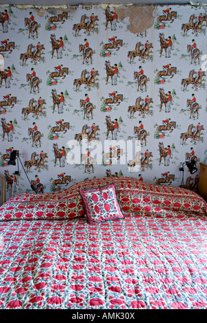 Wallpaper decorated with a pony pattern in the child's bedroom of an old Welsh farmhouse Stock Photo