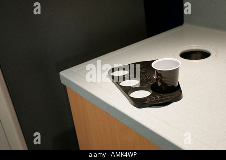 PEOPLE WORKING IN AN OFFICE ENVIRONMENT. Stock Photo