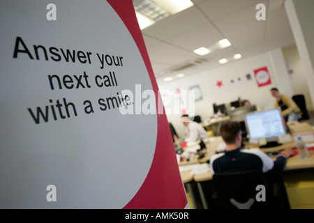 AN INSPIRATIONAL SIGN IN A CALL CENTRE. Stock Photo