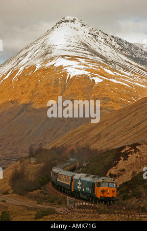 Beinn Dorain from the A82 with Special Enthusiasts Train passing Stock Photo