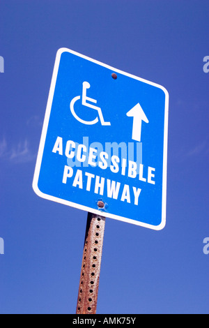 Sign pointing the way to a wheelchair accessible pathway Stock Photo