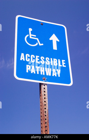 Sign pointing the way to a wheelchair accessible pathway Stock Photo ...