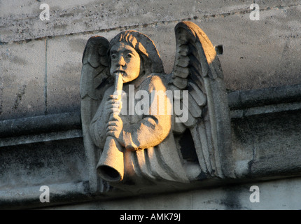 Angel gargoyle of Magdalen College Oxford, in soft morning light Stock Photo