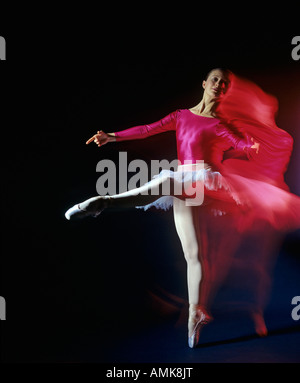 Young woman in a ballet position, studio shot Stock Photo