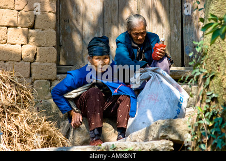 Two Old Chinese Women in the Rural Countryside town of Bai Sha near Yangshuo China Stock Photo