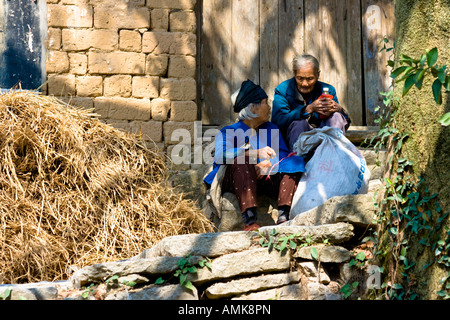 Two Old Chinese Women in the Rural Countryside town of Bai Sha near Yangshuo China Stock Photo