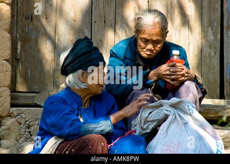 Two Old Chinese Women in the Rural Countryside town of Bai Sha near Yangshuo China Stock Photo