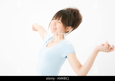 Young woman stretching Stock Photo