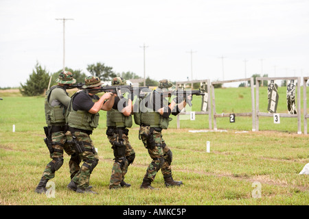 SORT officers during firearms range training. SORT is like prison SWAT and stands for Special Operations Response Team. Stock Photo