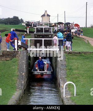 A canal boat entering Foxton Locks on the Grand Union Canal near Market Harborough, Leicestershire. Stock Photo