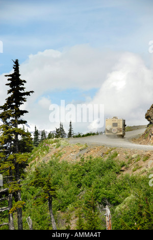 RV Recreational Vehicle traveling road to Salmon Glacier Stewart BC Canada near Hyder Alaska AK US travel vacation sightseeing