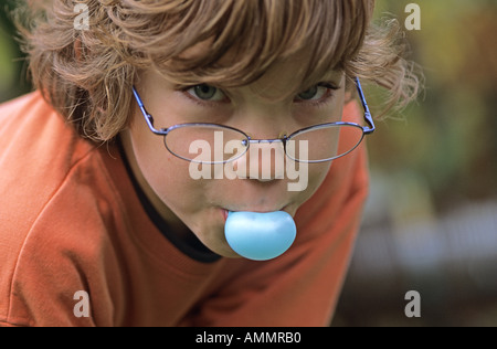 Boy chewing bubble gum Stock Photo