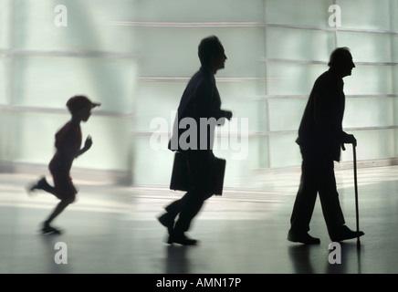 Silhouette of a boy, a man and a senior Stock Photo