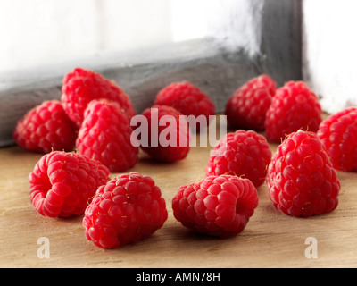 fresh picked Raspberries in a kitchen setting Stock Photo