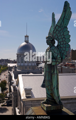 Angel atop the Notre-Dame-de-Bon-Secours Chapel and the dome of the Bonsecours Market, Marche Bonsecours in Old Montreal, Canada Stock Photo