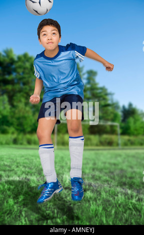 Boy Playing Soccer Stock Photo