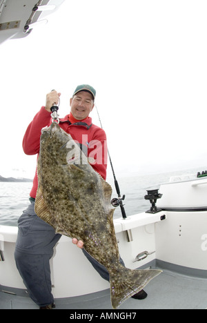 Halibut Rigs For Cook Inlet ALASKA COOK INLET FISHING CHARTER BOAT CAPTAIN CLEANING HALIBUT ON BOAT ...