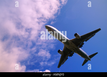 Airplane in Flight, Calgary, Alberta, Canada Stock Photo