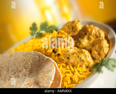 Chicken Korma with pilau rice. Indian curry. Stock Photo