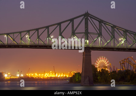 Pont Jacques-Cartier, Jacques Cartier Bridge, La Ronde amusement park, and quay's at night in the city of Montreal, Canada. Stock Photo