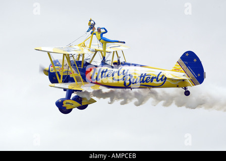 The Utterly Butterly aerobatics display team in action over Portrush and Downhill Stock Photo