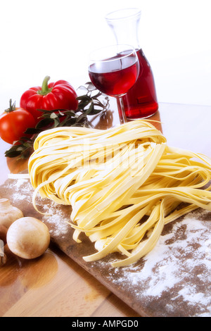 Fresh pasta and red wine Stock Photo