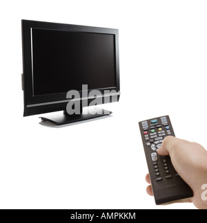TV set and a person with a remote Stock Photo