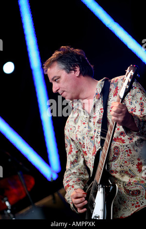 Peter Buck of REM ( R.E.M. ) playing on stage with Robyn Hitchcock and the Venus 3 Stock Photo