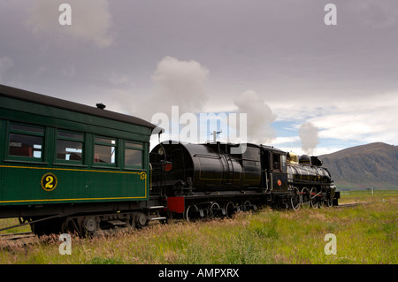 Kingston Flyer, a steam train built in 1925, at the Fairlight Station in Central Otago, South Island, New Zealand. Stock Photo