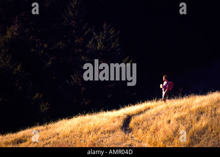 Model released man resting while hiking on Mt Tamalpais Stock Photo