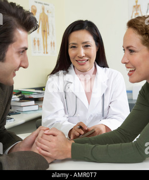 Doctor With Patients Stock Photo