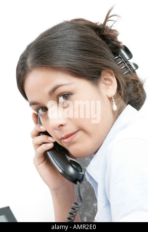 Young business woman on the phone at work Stock Photo