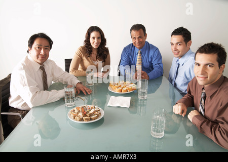 Business People in Boardroom Stock Photo