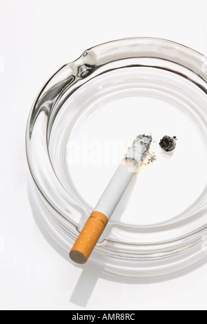 Cigarette in Ashtray Stock Photo